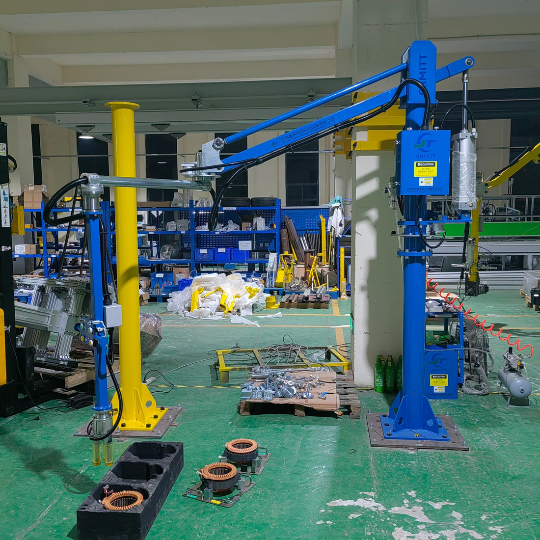 HB Torque zero-gravity pneumatic manipulator lifting a Toyota MG1 stator on an automated production line.