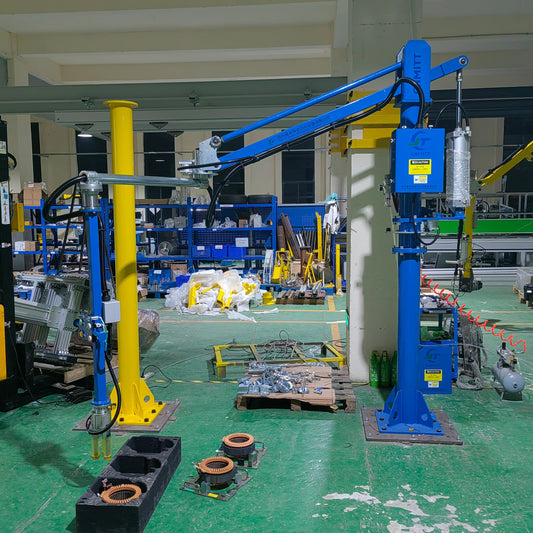 HB Torque zero-gravity pneumatic manipulator lifting a Toyota MG1 stator on an automated production line.