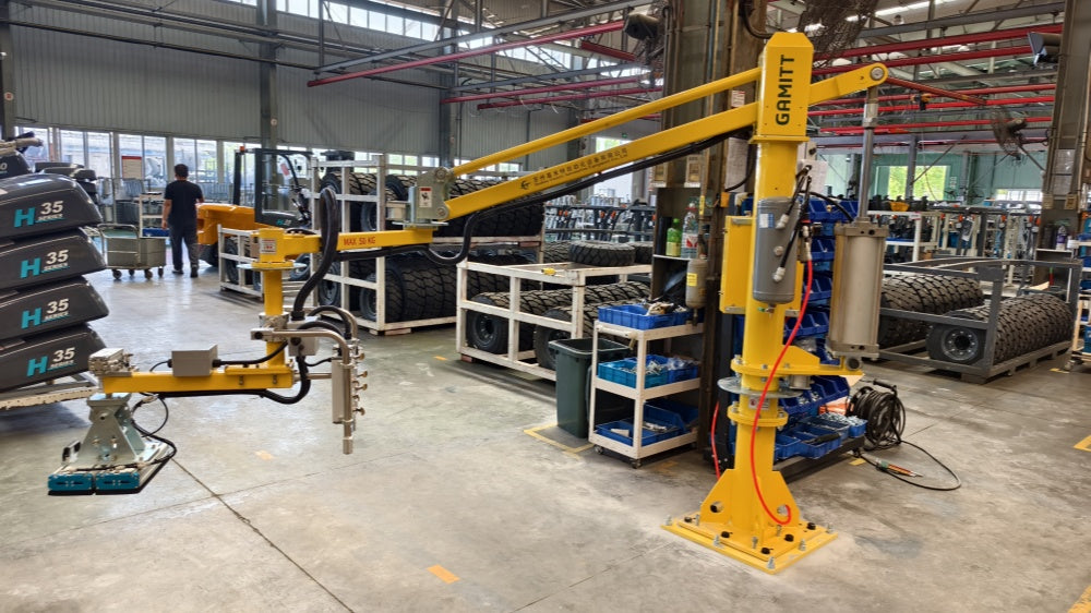 HUABOW custom vacuum gripper handling a painted forklift cover plate with zero damage