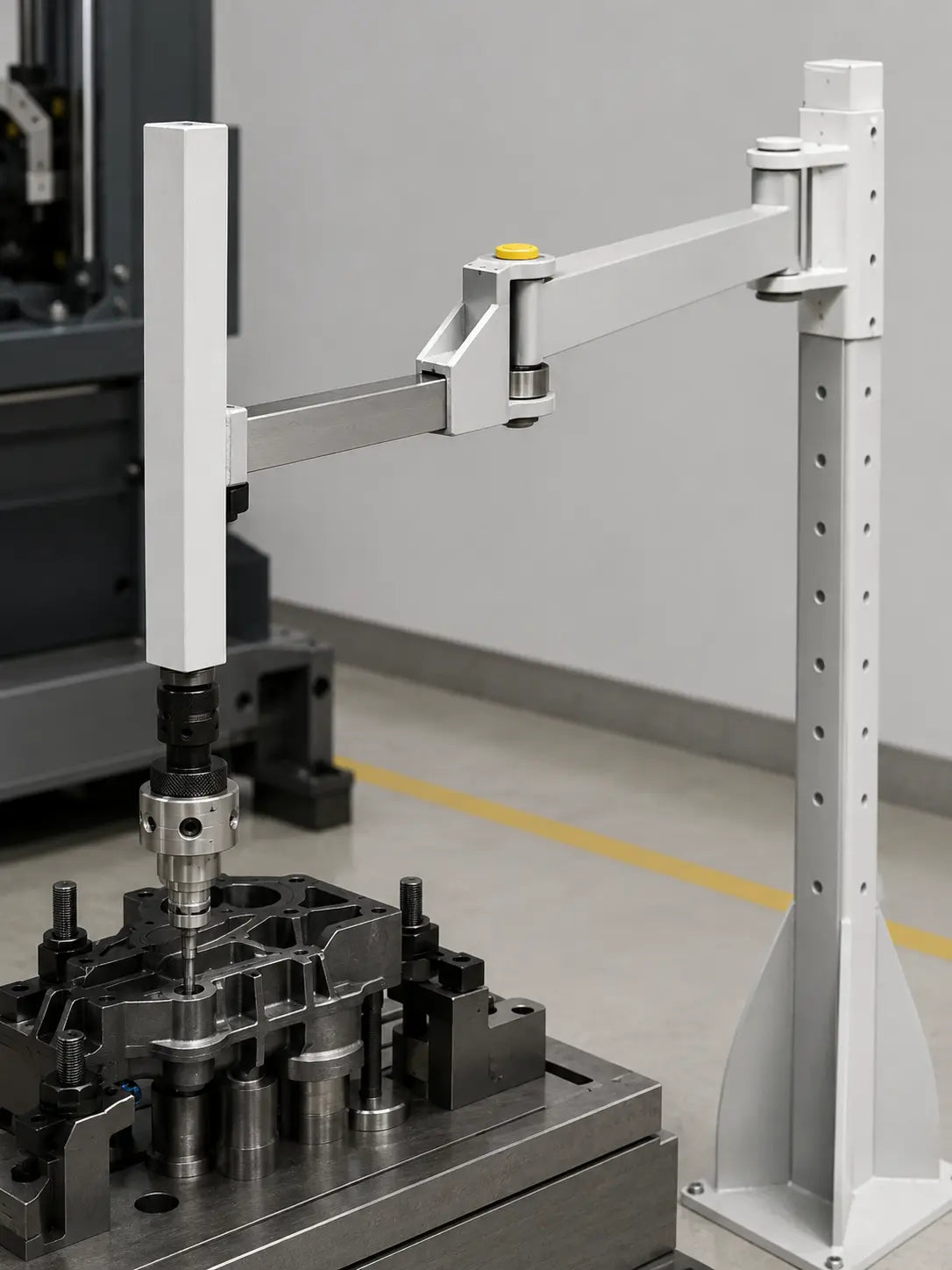 YEBO YBA-HA rigid articulated arm and machined tool adapter over precision fixture